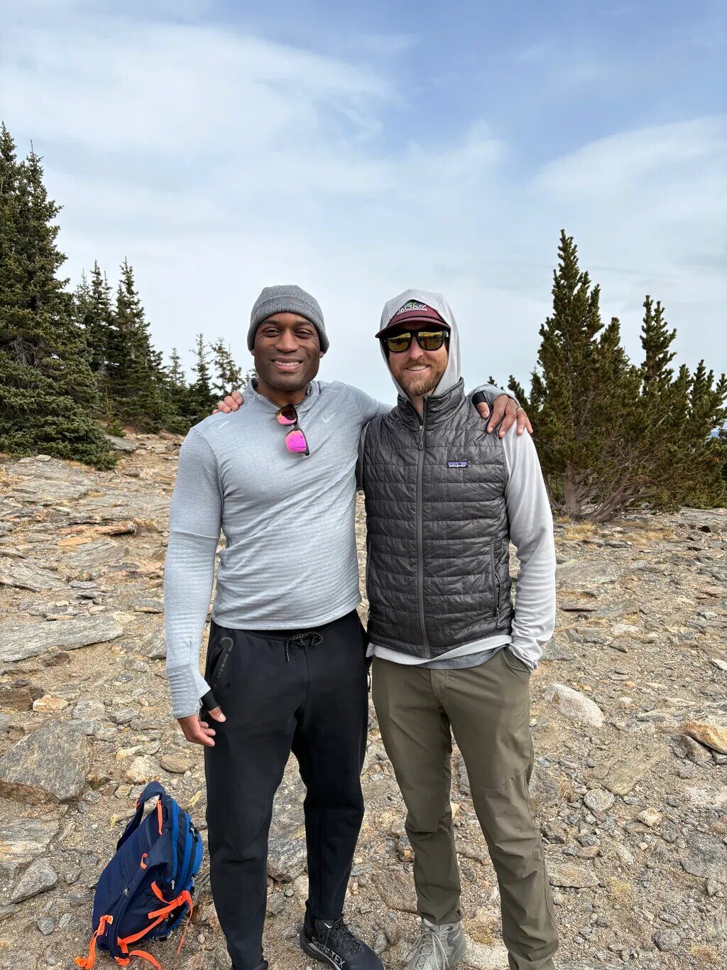 Ian with a friend at a Colorado summit